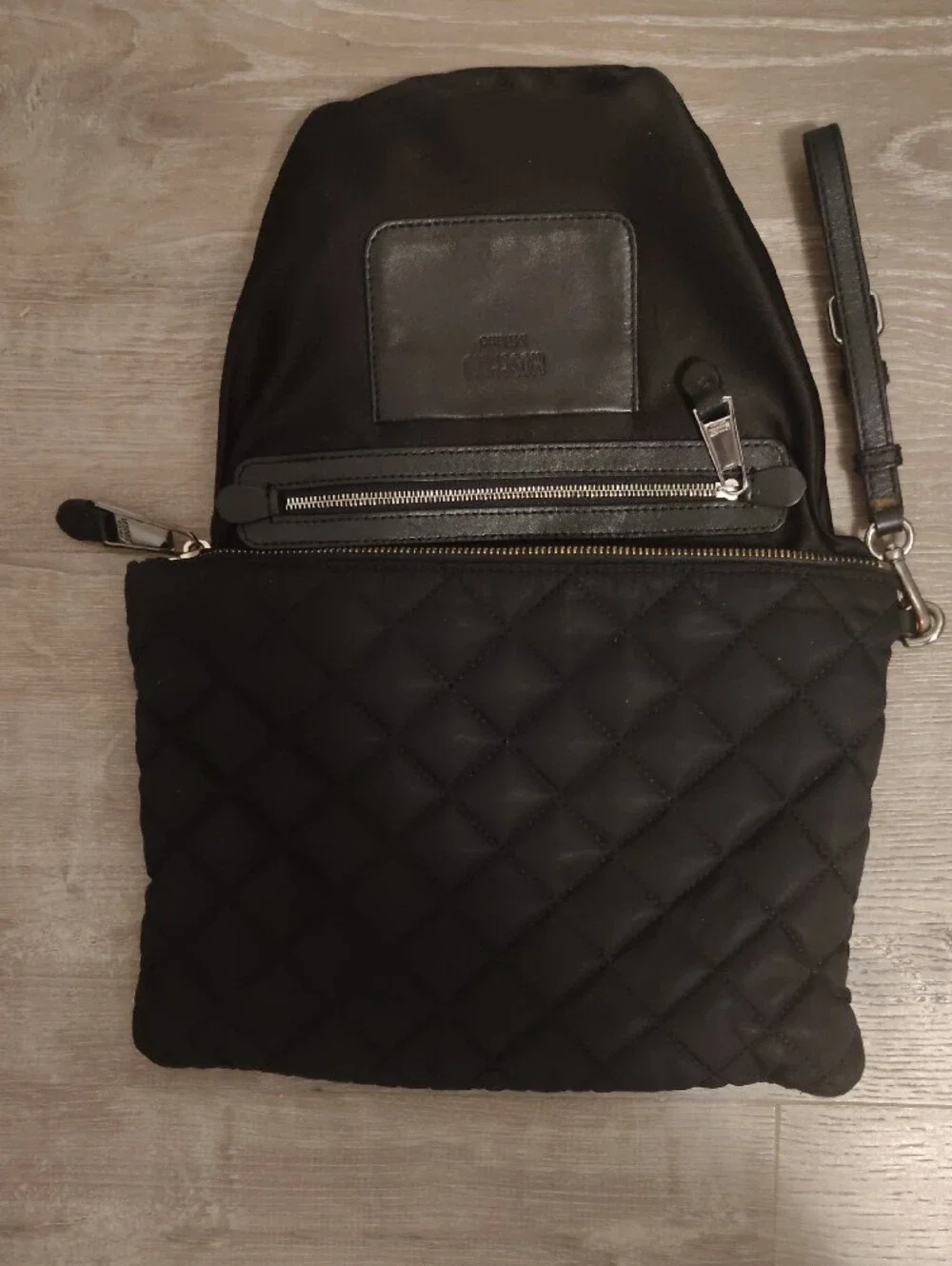 Moschino Black Quilted Wristlet with Shiny Silver Logo